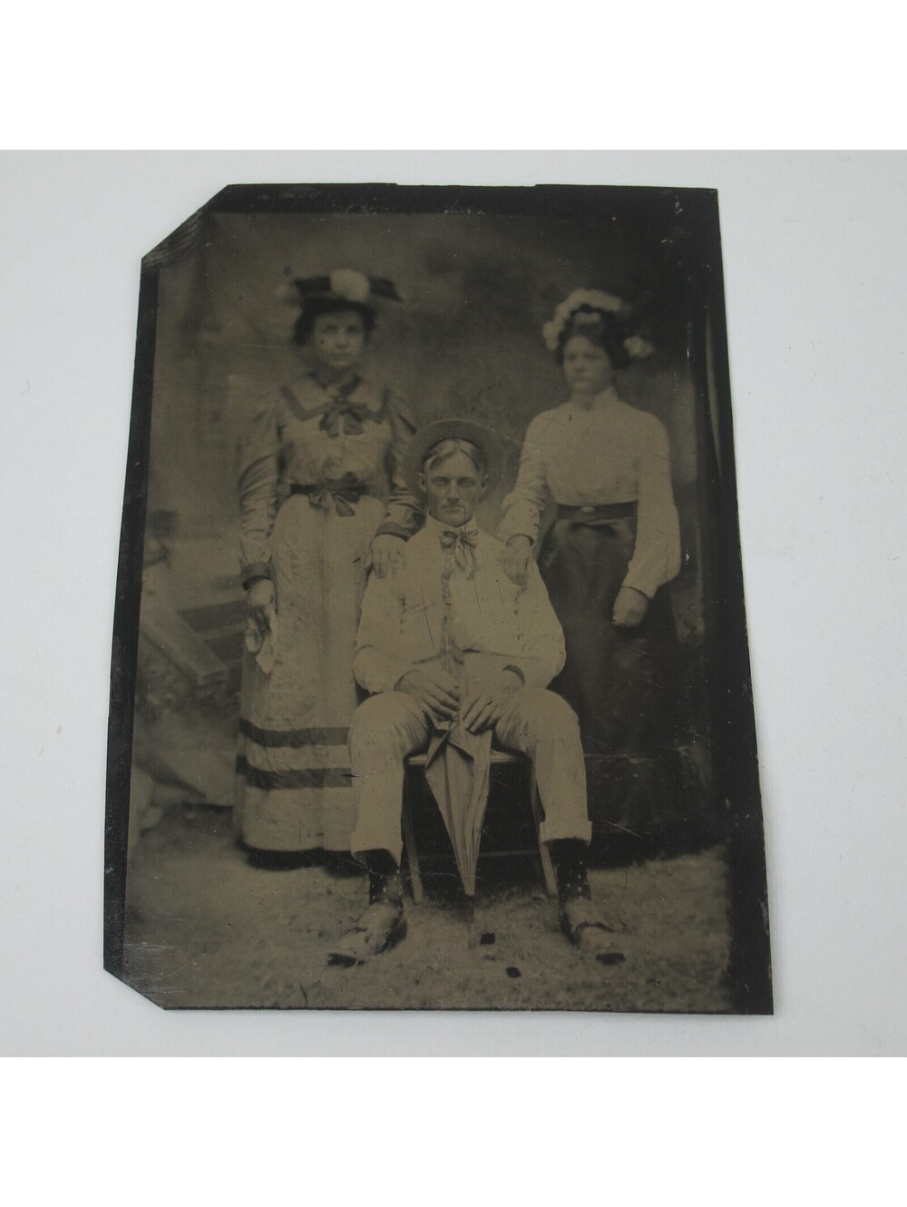 Tintype Photo 2 Young Women & Man in Hat Sitting with Umbrella Antique 1890s